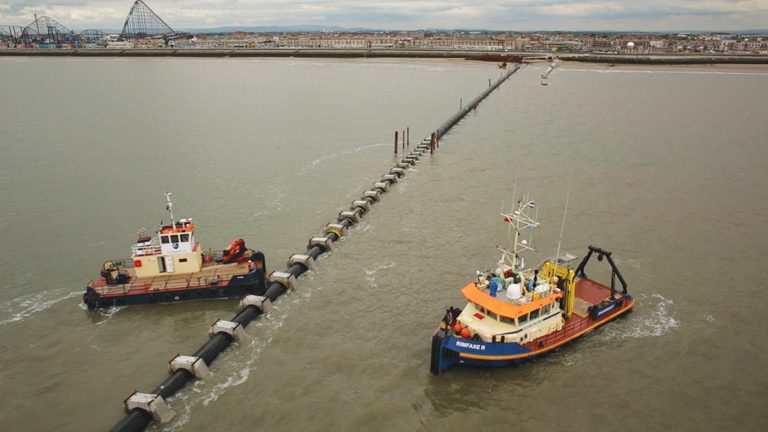 Harrowside pipe Installation - Courtesy of Land & Marine