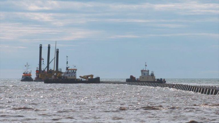 Harrowside pipe Installation - Courtesy of Land & Marine