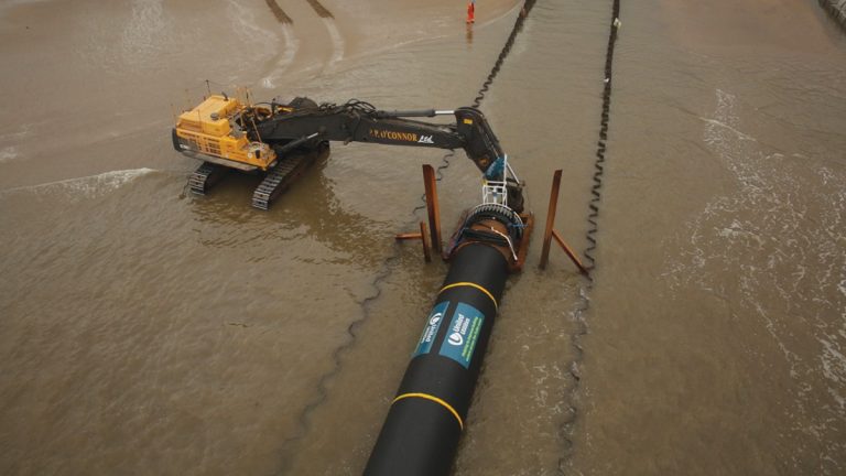 Harrowside pipe Installation - Courtesy of Land & Marine