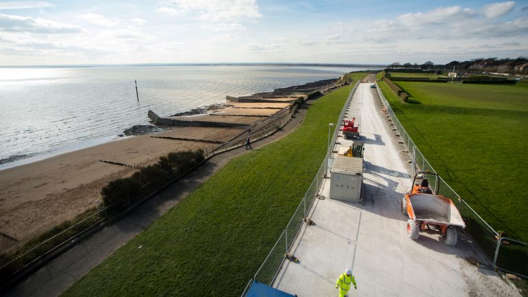 Aerial view of access road and cliff edge along the coastline - Courtesy of Southern Water