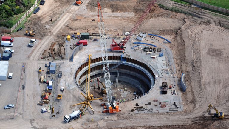 Cutting shoe installation showing guide beams - Courtesy of C2V+