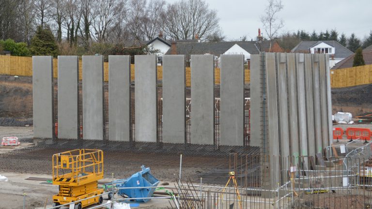 Installation of PCC wall units - Courtesy of JN Bentley Ltd