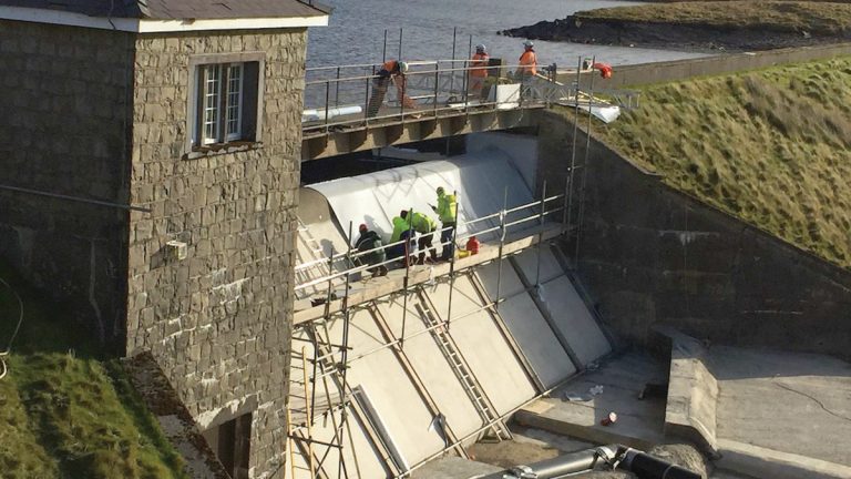Liner installation over weir crest - Courtesy of Dŵr Cymru Welsh Water