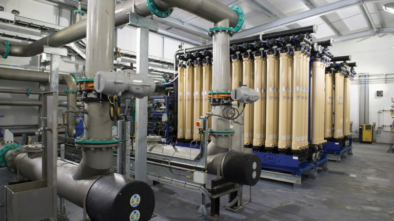 (Foreground) UV disinfection - (Background) MF racks - Courtesy of South East Water/Ady Kerry