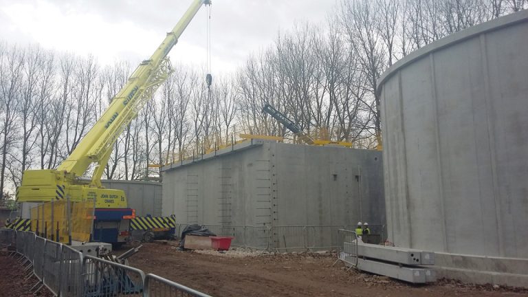 View of PST, ASP and FST. Placement of ASP PCC walkways prior to post-tensioning - Courtesy of C2V+