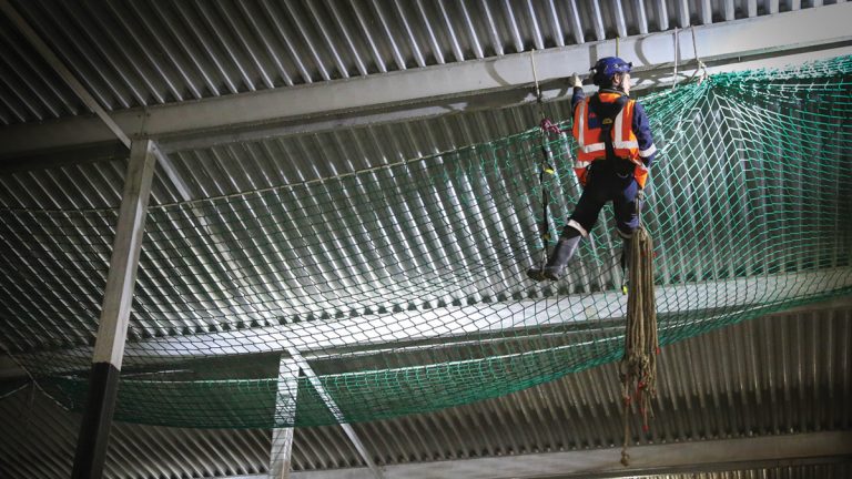 A separate team erected scaffolding and fixed safety netting to the roof, providing safe internal access to the vents - Courtesy of Stonbury