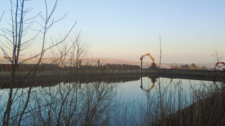 Piles installed short of design depth using a Movax vibrating hammer. This was overcome using an air hammer - Courtesy of MMB