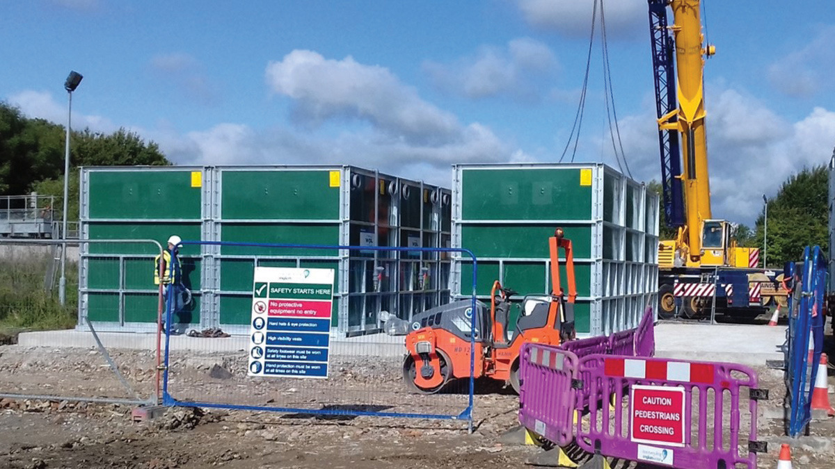 SAF units being lifted into position using a 100t crane and bolted together in two banks of six - Courtesy of Barhale Ltd