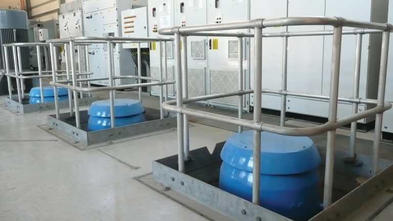 Existing inverters and new pump protection control panel. New pumps installed through existing floor openings - Courtesy of Bristol Water