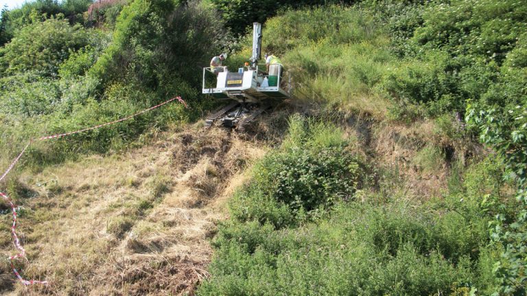 Rig in operation on slope - Courtesy of Geotechnical Engineering Ltd