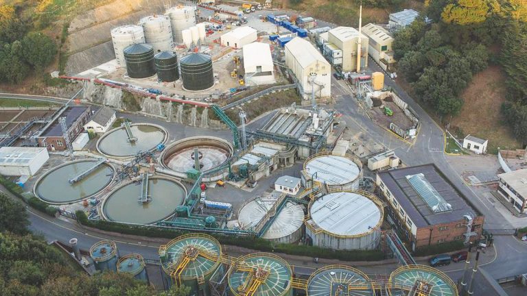 Figure 3: Existing Bellozanne STW site 2014. Looking northeast over the inlet works and PSTs with the new sludge treatment facility under construction - Courtesy of Matt Porteus Photography