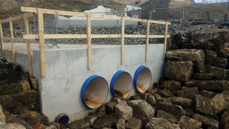 Figure 7: Spillway discharge structure during construction (viewed looking upstream) - Courtesy of MMB