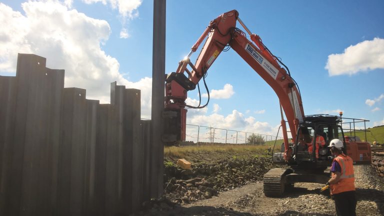 Figure 9: Installation of the GU16-N sheet-pile wall on the southern embankment - Courtesy of MMB