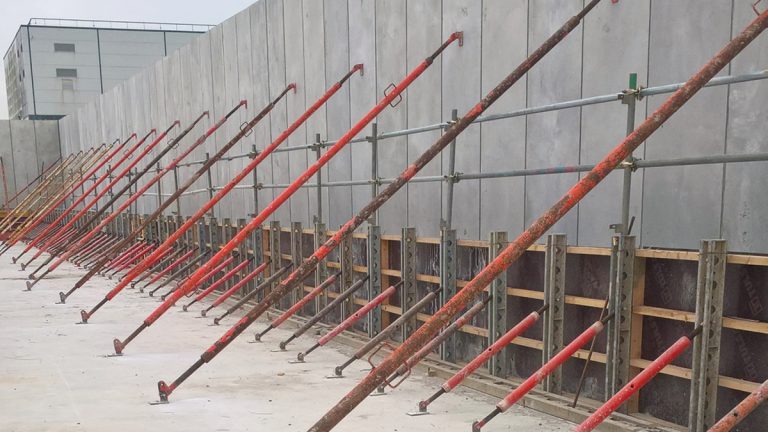 Temporary propping of the PCC wall unit prior to pouring of the in situ ring beam base - Courtesy of MMB