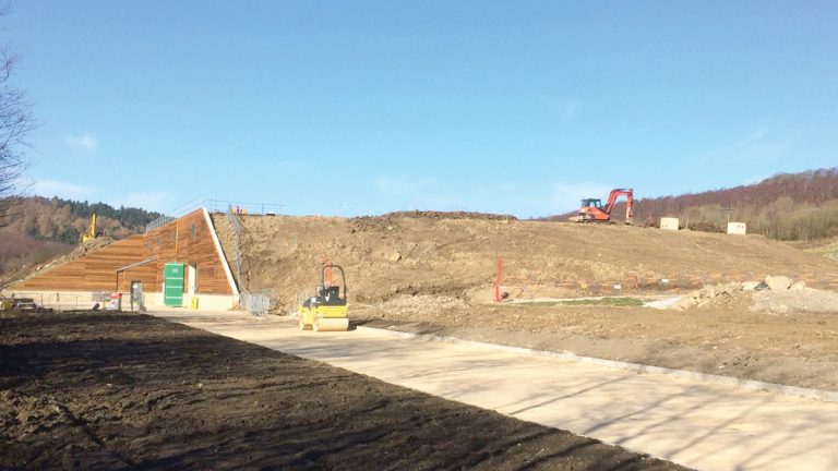 Completed clarifier building being buried and hidden from view - Courtesy of MMB