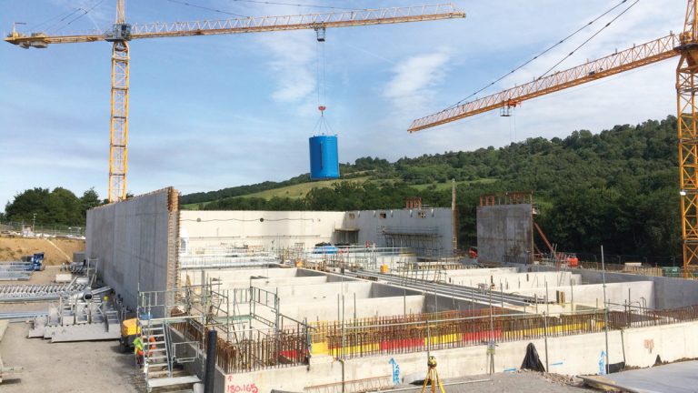 Clarifier building construction - ferric tank installation - Courtesy of MMB