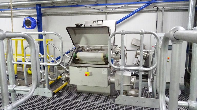 The installed Salsnes Filter and access platform within the treatment plant building at Rothera - Courtesy of British Antarctic Survey