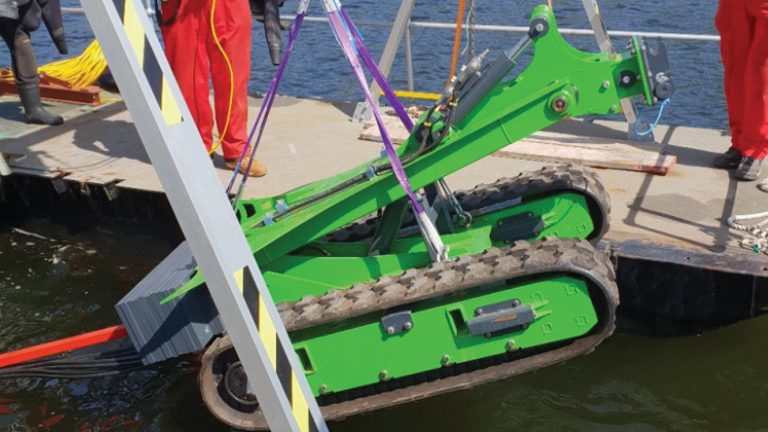 ROV being lowered into the reservoir from the diving pontoon - Courtesy of Dŵr Cymru Welsh Water
