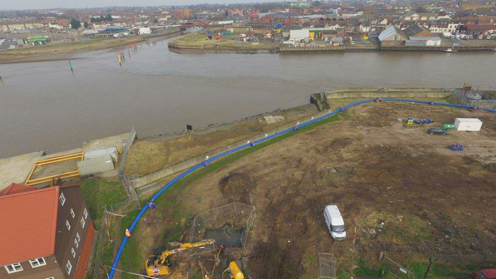 The welded polyethylene pipe is laid out in one continuous length prior to being pulled through - Courtesy of Northumbrian Water Limited