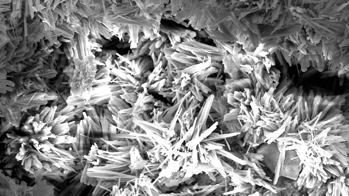 Concrete waterproofing by crystallisation. Crystalline growth continues to develop and mature as the diffusion front progresses deeper into the concrete - Courtesy of Xypex