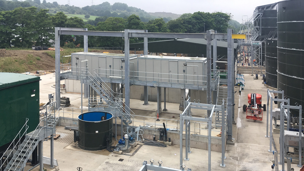 Sludge dewatering centrifuges during construction - Courtesy of YWS