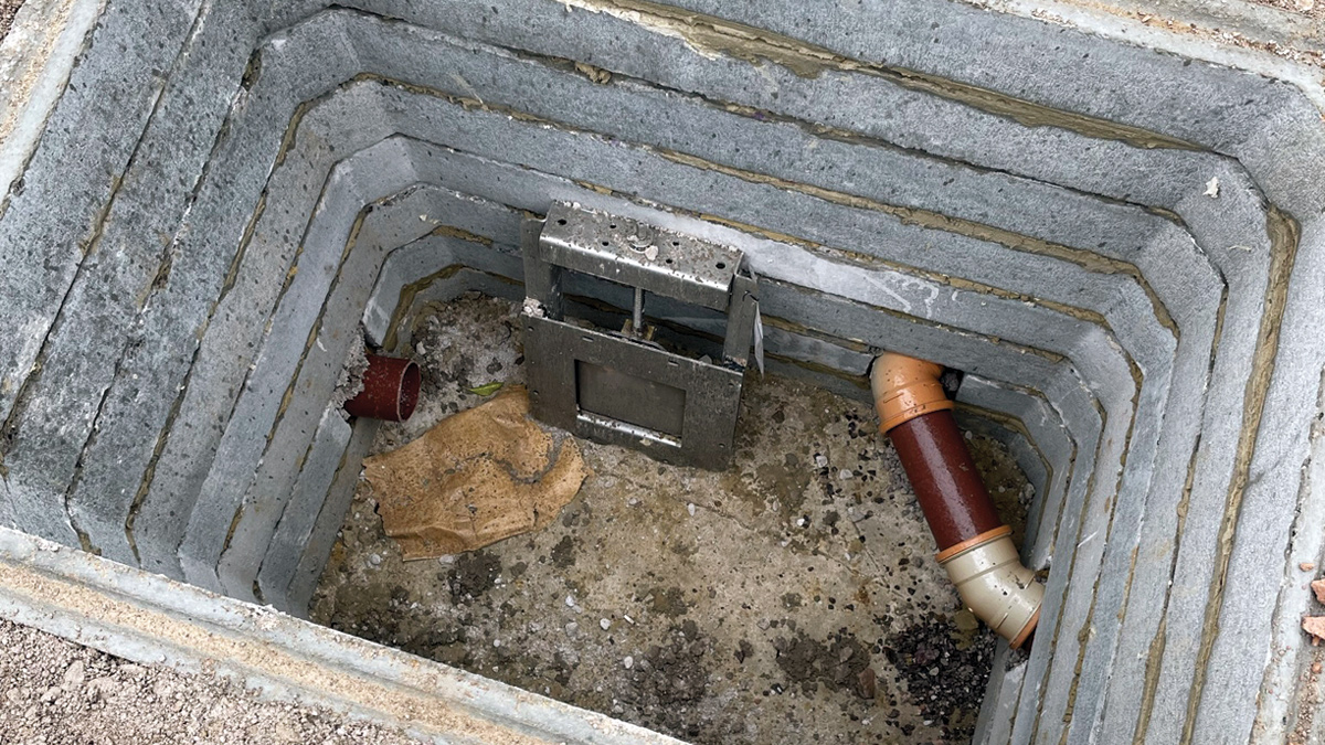 Penstock ready to be installed over the outgoing pipe (on the left) within a manhole chamber upstream of the wet well - Courtesy of Wessex Water
