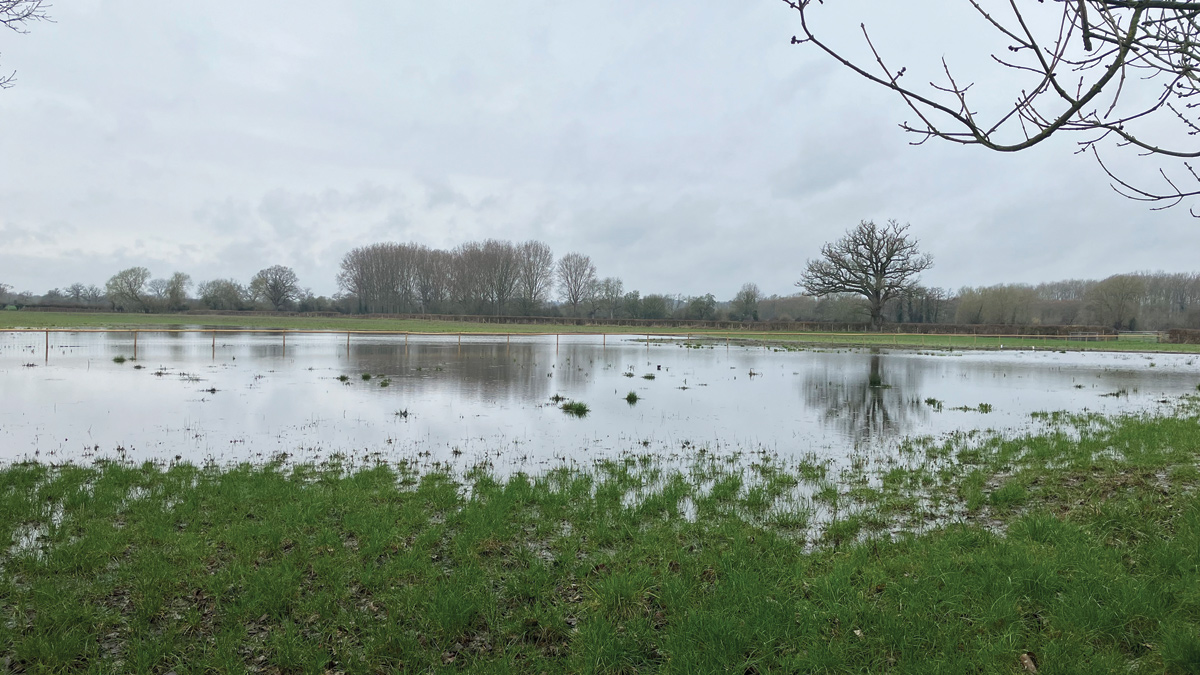 Flood plain location of contact tanks - Courtesy of MMB